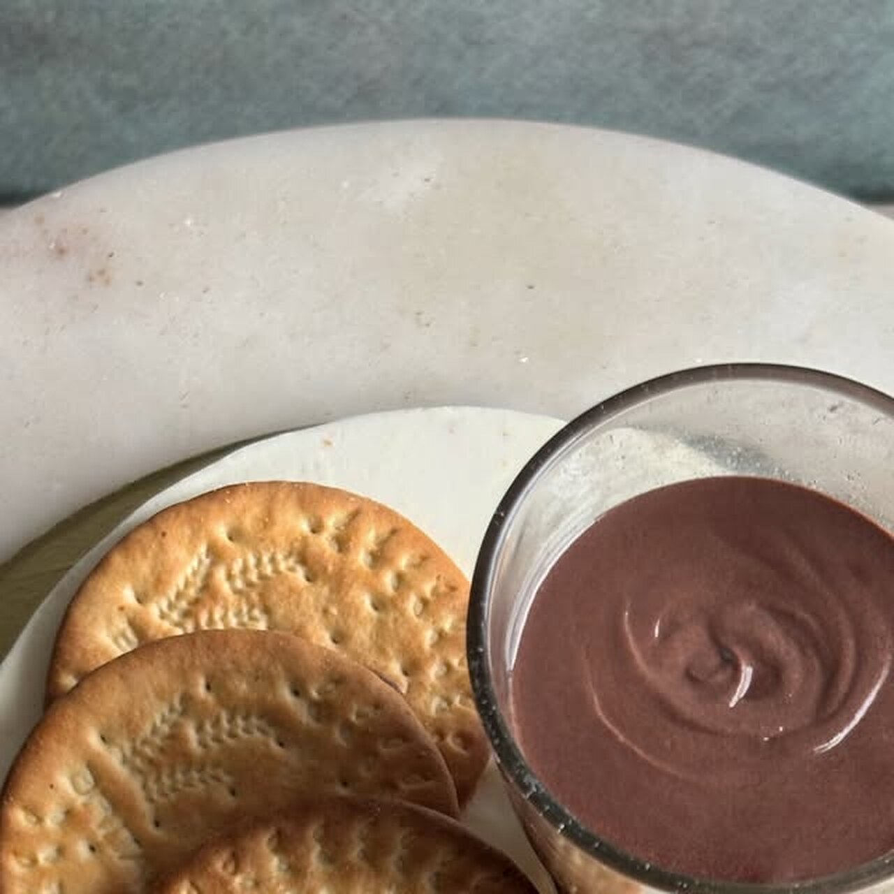 Chai and biscuits alongside fresh bakes